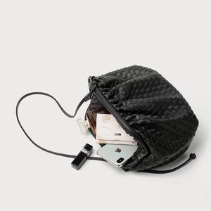 Beautiful trendy black leather bucket dumpling bag